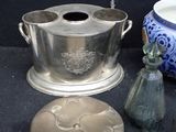 a lot of glass items that are sitting on a table