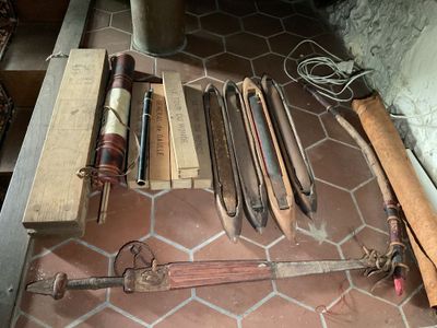 a lot of old tools that are on the floor