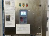 a machine that is sitting inside of a building