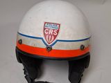 an image of a white helmet with an orange and blue stripe