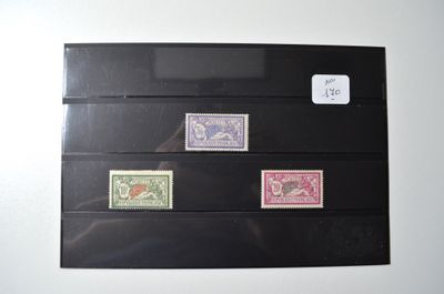 five different stamps on a piece of paper on the wall