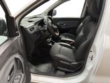 the interior of a car with the door open and the driver ' s seat down