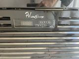 a close up of a toaster oven with a timer on it