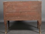an old wooden chest with a drawer on it