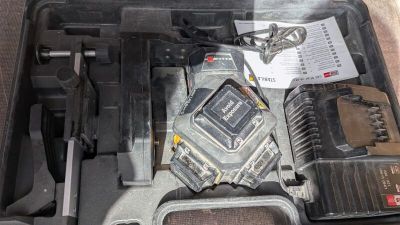 an open case with a cell phone inside of it