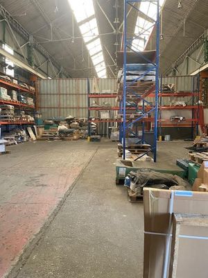a large warehouse filled with lots of boxes and boxes