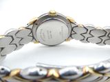 an image of a close up of a wrist watch on a white surface