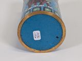 a blue vase with a picture of a horse on it