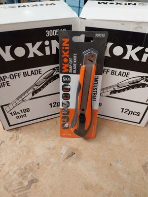 two boxes of tools that are sitting on the floor
