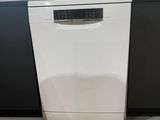 a picture of a dishwasher in the middle of a kitchen