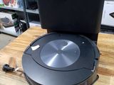 a robot that is sitting on top of a wooden table