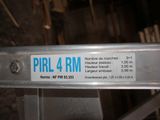 a close up of a metal object with a blue sticker on it