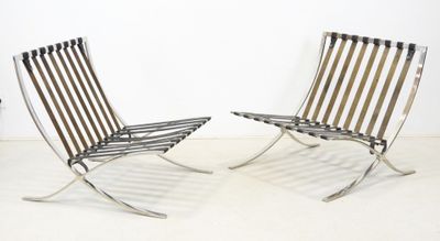 pair of lounge chairs designed by mies van deren