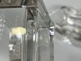 a glass container with a small amount of sugar in it