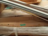 a pile of boxes and a mirror in a room