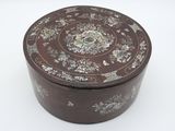 an image of a brown box with a floral design on it