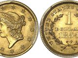 l'image d'une pièce d'or sur laquelle figure une tête de femme