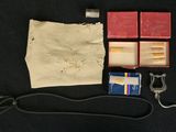 a small bag of items that are on a black table