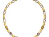 un bracelet en or et en argent orné de pierres multicolores