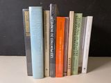 a bunch of books that are sitting on a table