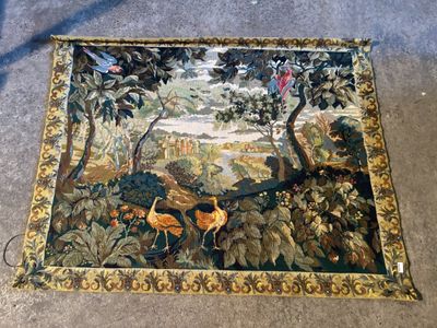 a tapestry hanging on the wall of a room