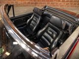 an image of a car with leather seats in the back of it