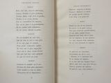 an open book with a poem in it on a table