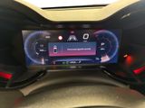 the dashboard of a car with a digital display on it