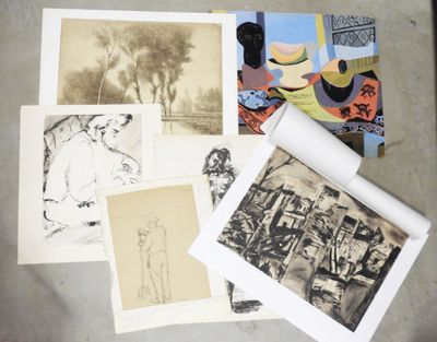a lot of pictures that are on a table