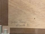 an image of a close up of a piece of wood with writing on it