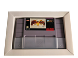 a video game in a white box on the wall
