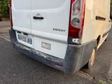 a white van parked on the side of the road