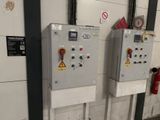 two electrical switches on the wall of a building