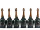 six bouteilles de champagne alignées