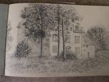 a drawing of a house in a field with trees