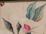 a picture of a painting of a rose on the wall