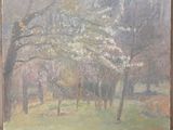 une peinture accrochée au mur d'un parc arboré