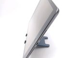 a close up of a tablet computer on a stand