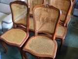 a lot of chairs and a couch in a room