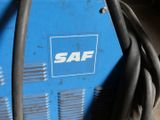 a blue machine that is sitting on the floor