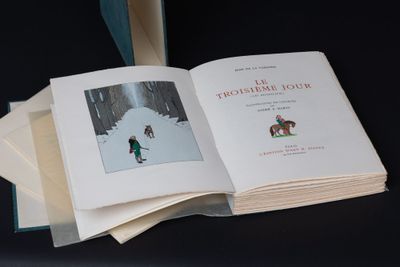un livre sur lequel figure l'image d'une personne à cheval dans la neige