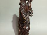 statue of a woman holding a child in her arms