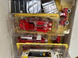 many different types of toy vehicles in the box
