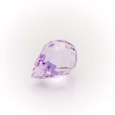 a close up of a purple diamond on a white background