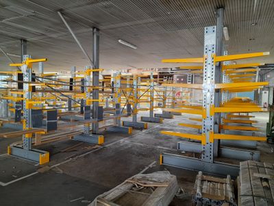 an image of a large warehouse filled with lots of shelves