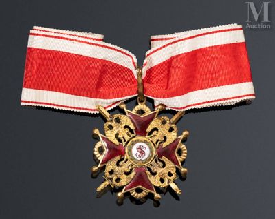 une image représentant un ruban rouge et blanc orné d'une étoile dorée