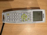 a remote control that is sitting on a table