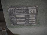 a sign on the side of a machine that says marmo mecania