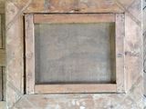 a picture of a picture frame on a wooden floor
