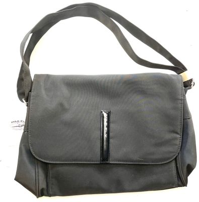grey shoulder bag with black zippers and a black strap